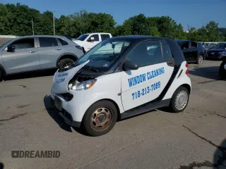 2015 Smart fortwo Passion with VIN WMEEJ3BA8FK820772, listed as a Copart auction lot 64667495 with 98,317 mi miles and Salvage title. Bid and sale history available at DreamBid. Image 1.