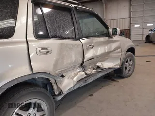 2000 Honda CR-V SE with VIN JHLRD1879YC037127, listed as a IAAI auction lot 41285624 with 246,170 mi miles. Bid and sale history available at carsss.com. Image 6.