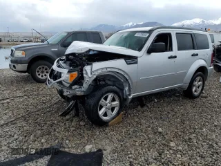 2010 Dodge Nitro SXT z VIN 1D4PT5GK3AW131922, wystawiony jako Copart lot #51238695 z przebiegiem 158 434 mil mil oraz Szkody całkowita. Historia ofert i sprzedaży dostępna na DreamBid. Obrazek 1.