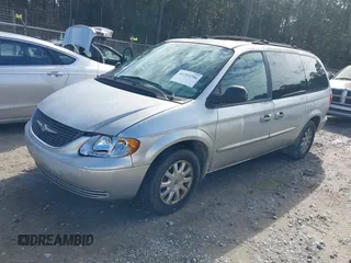 2003 Chrysler Town & Country LX with VIN 2C4GP44L03R203678, listed as a IAAI auction lot 41293296 with 210,827 mi miles and . Bid and sale history available at DreamBid. Image 2.