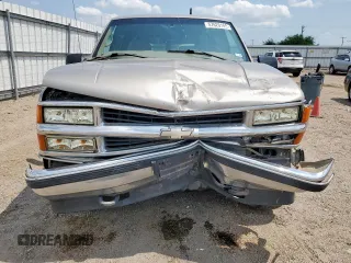 1999 Chevrolet Suburban z VIN 3GNFK16R2XG191868, wystawiony jako Copart lot #57620165 z przebiegiem 128 526 mil mil oraz Szkoda całkowita • Salvage title. Historia ofert i sprzedaży dostępna na DreamBid. Obrazek 5.