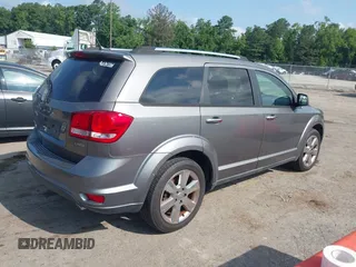 2012 Dodge Journey Crew with VIN 3C4PDCDG9CT199567, listed as a IAAI auction lot 42738030 with 140,864 mi miles and . Bid and sale history available at DreamBid. Image 4.