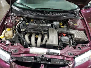 1999 Dodge Stratus z VIN 1B3EJ46X4XN676917, wystawiony jako Copart lot #85511864 z przebiegiem 135 783 mil mil oraz Szkoda całkowita • Salvage title. Historia ofert i sprzedaży dostępna na DreamBid. Obrazek 11.
