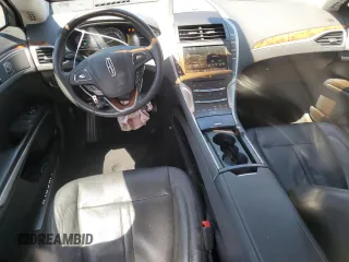 2013 Lincoln MKZ Hybrid with VIN 3LN6L2LU1DR808323, listed as a Copart auction lot 58077725 with 128,837 mi miles and Salvage title. Bid and sale history available at DreamBid. Image 8.