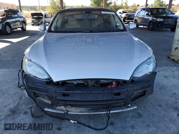 2013 Tesla Model S with VIN 5YJSA1DNXDFP04134, listed as a Copart auction lot 76516714 with 150,560 mi miles and Clean title. Bid and sale history available at DreamBid. Image 5.