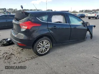 2017 Ford Focus Titanium z VIN 1FADP3N23HL291408, wystawiony jako Copart lot #83876124 z przebiegiem Nie podano mil oraz Szkoda całkowita • Salvage title. Historia ofert i sprzedaży dostępna na DreamBid. Obrazek 3.