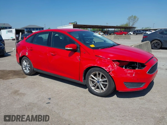 2016 Ford Focus SE with VIN 1FADP3F2XGL205797, listed as a IAAI auction lot 41987209 with 129,042 mi miles. Bid and sale history available at carsss.com. Image 6.