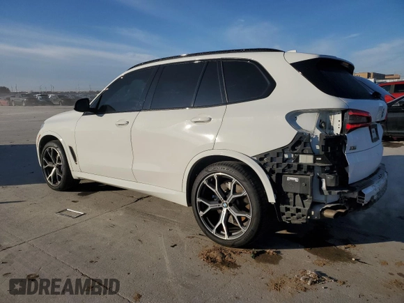 2020 BMW X5 M50i with VIN 5UXJU4C01LLE45993, listed as a Copart auction lot 88904235 with 64,841 mi miles and Salvage Title. Bid and sale history available at DreamBid. Image 2.