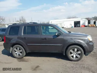2012 Honda Pilot Touring with VIN 5FNYF4H91CB070026, listed as a IAAI auction lot 41846278 with 213,387 mi miles. Bid and sale history available at carsss.com. Image 13.