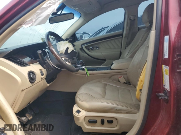 2014 Ford Taurus Limited z VIN 1FAHP2F82EG141034, wystawiony jako Copart lot #52579995 z przebiegiem 207 709 mil mil oraz Szkoda całkowita • Salvage title. Historia ofert i sprzedaży dostępna na DreamBid. Obrazek 7.