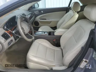 2010 Jaguar XK with VIN SAJWA4GB4ALB37114, listed as a Copart auction lot 77673824 with 99,999 mi miles and Salvage Title. Bid and sale history available at carsss.com. Image 7.