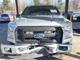 2015 Ford F-150 XLT with VIN 1FTEW1C86FKE85267, listed as a IAAI auction lot 41527996 with 119,800 mi miles and . Bid and sale history available at carsss.com. Image 6.