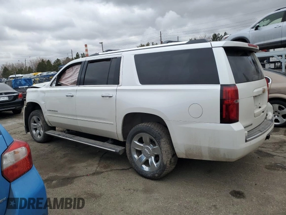 2017 Chevrolet Suburban Premier with VIN 1GNSKJKC6HR305372, listed as a Copart auction lot 47477705 with 141,324 mi miles and Salvage Title. Bid and sale history available at DreamBid. Image 2.