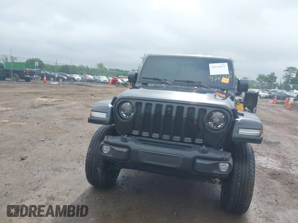 2023 Jeep Gladiator Overland with VIN 1C6JJTFM9PL593659, listed as a IAAI auction lot 42470253 with 34,374 mi miles and . Bid and sale history available at DreamBid. Image 12.