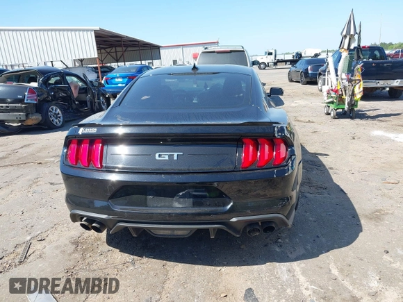 2021 Ford Mustang GT z VIN 1FA6P8CFXM5156002, wystawiony jako IAAI lot #42009222 z przebiegiem 65 939 mil mil oraz . Historia ofert i sprzedaży dostępna na DreamBid. Obrazek 16.