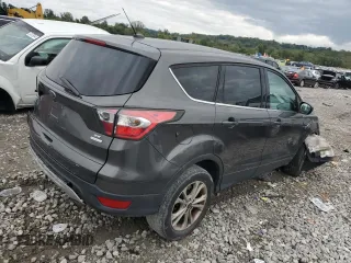 2017 Ford Escape SE with VIN 1FMCU0GD7HUB28357, listed as a Copart auction lot 73229554 with 121,912 mi miles and Salvage Title. Bid and sale history available at carsss.com. Image 4.