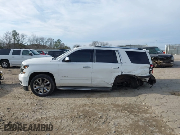 2015 Chevrolet Tahoe LTZ z VIN 1GNSKCKC5FR177134, wystawiony jako IAAI lot #41460583 z przebiegiem 202 924 mil mil oraz . Historia ofert i sprzedaży dostępna na DreamBid. Obrazek 14.