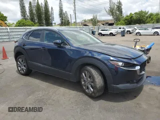 2023 Mazda CX-30 S Preferred with VIN 3MVDMBCM2PM555893, listed as a Copart auction lot 58480415 with 24,812 mi miles and Non repairable. Bid and sale history available at DreamBid. Image 4.