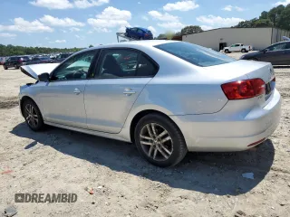 2014 Volkswagen Jetta S with VIN 3VW2K7AJ3EM227817, listed as a Copart auction lot 61415465 with 121,248 mi miles and Salvage title. Bid and sale history available at DreamBid. Image 2.