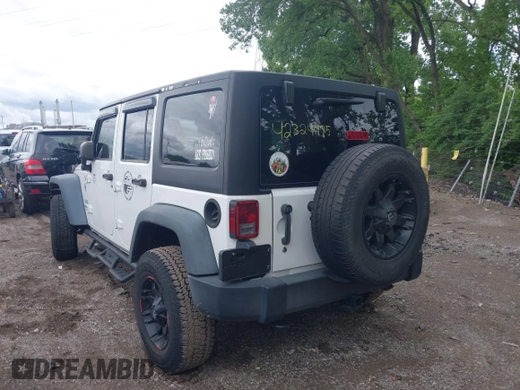 2014 Jeep Wrangler Unlimited Sport with VIN 1C4BJWDG9EL135077, listed as a IAAI auction lot 42324775 with 104,221 mi miles and . Bid and sale history available at DreamBid. Image 3.