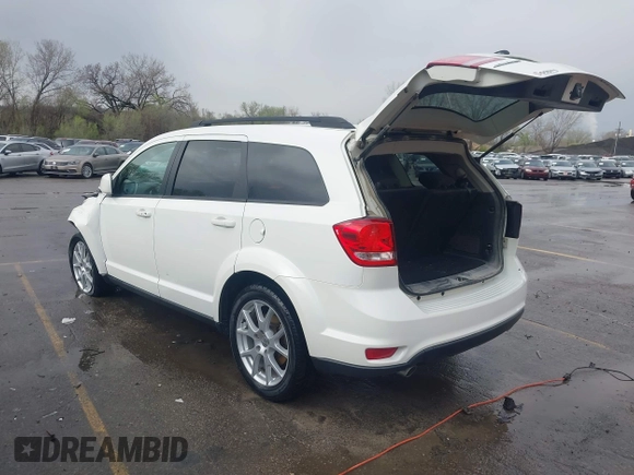 2015 Dodge Journey SXT with VIN 3C4PDCBG3FT722959, listed as a IAAI auction lot 41894488 with 80,359 mi miles. Bid and sale history available at carsss.com. Image 3.