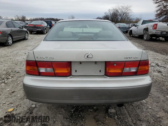 1999 Lexus ES 300 Luxury Sport Sdn with VIN JT8BF28G2X5055176, listed as a Copart auction lot 81832974 with 303,489 mi miles and Salvage Title. Bid and sale history available at carsss.com. Image 6.