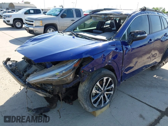 2022 Toyota Corolla Cross XLE with VIN 7MUDAAAG8NV027585, listed as a IAAI auction lot 41781177 with 36,841 mi miles and . Bid and sale history available at DreamBid. Image 6.