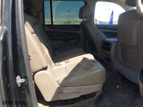 2015 Chevrolet Suburban LT with VIN 1GNSCJKC2FR281629, listed as a IAAI auction lot 41849300 with 133,842 mi miles. Bid and sale history available at carsss.com. Image 8.