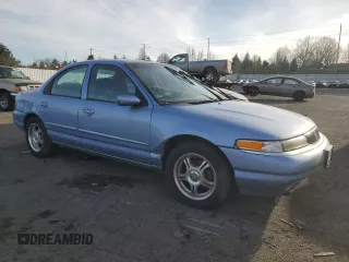 1996 Mercury Mystique z VIN 1MELM6532TK639432, wystawiony jako Copart lot #41884055 z przebiegiem 134 991 mil mil oraz Tytuł czysty. Historia ofert i sprzedaży dostępna na DreamBid. Obrazek 4.