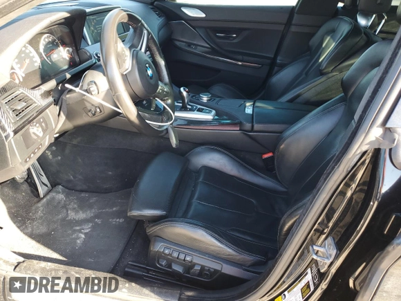 2015 BMW M6 z VIN WBS6C9C5XFD467952, wystawiony jako Copart lot #46312895 z przebiegiem 79 807 mil mil oraz Szkoda całkowita • Salvage title. Historia ofert i sprzedaży dostępna na DreamBid. Obrazek 7.