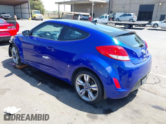 2013 Hyundai Veloster w/Black Int with VIN KMHTC6AD6DU143974, listed as a IAAI auction lot 42164745 with 136,195 mi miles and . Bid and sale history available at DreamBid. Image 3.