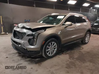 2023 Cadillac XT4 AWD Luxury with VIN 1GYFZBR48PF174059, listed as a IAAI auction lot 41505630 with 4,757 mi miles. Bid and sale history available at carsss.com. Image 2.