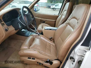 1996 Ford Explorer XLT z VIN 1FMDU32P1TZB95989, wystawiony jako Copart lot #60714735 z przebiegiem 166 081 mil mil oraz Szkoda całkowita • Salvage title. Historia ofert i sprzedaży dostępna na DreamBid. Obrazek 7.