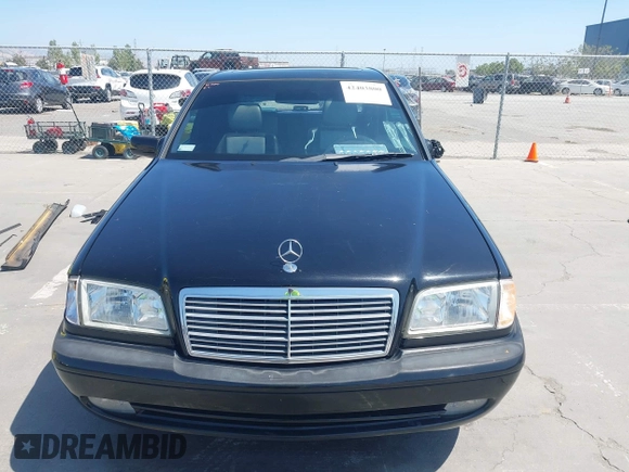 1999 Mercedes-Benz C with VIN WDBHA33G3XF889442, listed as a IAAI auction lot 42403800 with 82,075 mi miles and . Bid and sale history available at DreamBid. Image 12.
