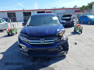 2016 Honda Pilot EX with VIN 5FNYF5H3XGB021575, listed as a IAAI auction lot 41853099 with 141,848 mi miles. Bid and sale history available at carsss.com. Image 6.