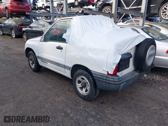 2000 Chevrolet Tracker z VIN 2CNBE18C3Y6920718, wystawiony jako IAAI lot #41566833 z przebiegiem 157 316 mil mil oraz . Historia ofert i sprzedaży dostępna na DreamBid. Obrazek 3.
