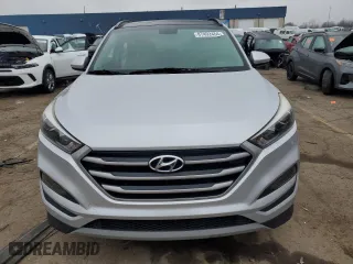 2018 Hyundai Tucson Value with VIN KM8J33A28JU748241, listed as a Copart auction lot 87492464 with 56,457 mi miles and Salvage Title. Bid and sale history available at carsss.com. Image 5.