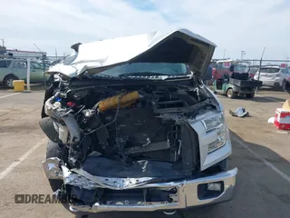 2015 Ford F-150 XLT with VIN 1FTEW1EG3FKD37310, listed as a IAAI auction lot 41681029 with 145,069 mi miles. Bid and sale history available at carsss.com. Image 13.