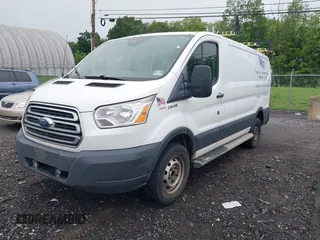 2018 Ford Transit with VIN 1FTYR1ZM1JKB18598, listed as a IAAI auction lot 42533470 with 215,015 mi miles and . Bid and sale history available at DreamBid. Image 17.