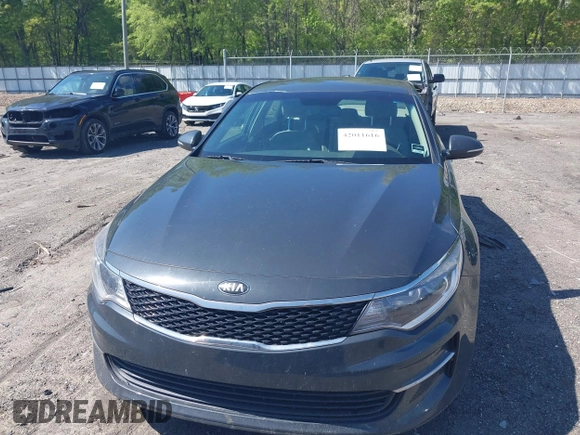 2016 Kia Optima LX with VIN KNAGT4L3XG5078248, listed as a IAAI auction lot 42011616 with 150,000 mi miles. Bid and sale history available at carsss.com. Image 12.
