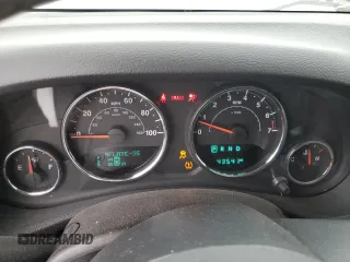 2015 Jeep Wrangler Altitude z VIN 1C4GJWBG8FL730965, wystawiony jako Copart lot #86276064 z przebiegiem 43 541 mil mil oraz Szkoda całkowita • Salvage title. Historia ofert i sprzedaży dostępna na DreamBid. Obrazek 9.