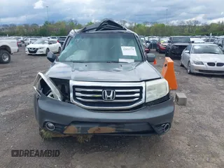 2013 Honda Pilot EX-L with VIN 5FNYF3H59DB034111, listed as a IAAI auction lot 42021779 with 223,572 mi miles. Bid and sale history available at carsss.com. Image 11.