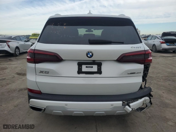 2021 BMW X5 sDrive40i with VIN 5UXCR4C0XM9H39322, listed as a Copart auction lot 47136385 with 72,535 mi miles and Salvage Title. Bid and sale history available at carsss.com. Image 6.