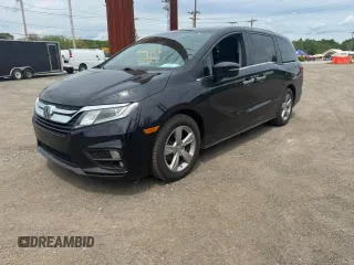 2019 Honda Odyssey EX-L z VIN 5FNRL6H78KB125979, wystawiony jako Copart lot #59495705 z przebiegiem 199 380 mil mil oraz Czysty tytuł • Clean title. Historia ofert i sprzedaży dostępna na DreamBid. Obrazek 2.