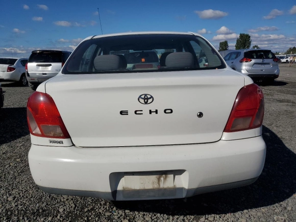 2002 Toyota ECHO with VIN JTDBT123020215409, listed as a Copart auction lot 71653384 with 265,969 mi miles and Salvage Title. Bid and sale history available at carsss.com. Image 6.