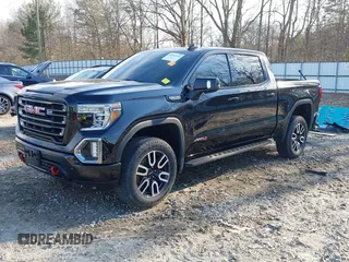 2021 GMC Sierra 1500 AT4 with VIN 1GTP9EEL4MZ450434, listed as a IAAI auction lot 41682550 with 64,336 mi miles. Bid and sale history available at carsss.com. Image 2.
