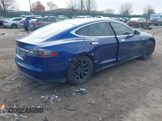 2016 Tesla Model S 90D with VIN 5YJSA1E21GF128362, listed as a IAAI auction lot 40891999 with 179,155 mi miles and . Bid and sale history available at DreamBid. Image 4.
