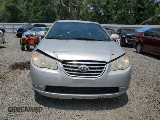 2010 Hyundai Elantra GLS with VIN KMHDU4AD4AU050694, listed as a Copart auction lot 57463205 with 125,228 mi miles and Salvage title. Bid and sale history available at DreamBid. Image 5.
