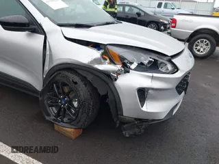 2020 Ford Escape SE Sport Hybrid with VIN 1FMCU9BZ4LUB92727, listed as a IAAI auction lot 41500226 with 46,869 mi miles and . Bid and sale history available at DreamBid. Image 6.
