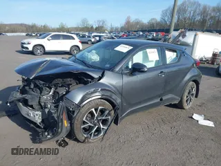2022 Toyota C-HR XLE z VIN NMTKHMBXXNR145682, wystawiony jako IAAI lot #42104874 z przebiegiem 88 141 mil mil oraz . Historia ofert i sprzedaży dostępna na DreamBid. Obrazek 2.
